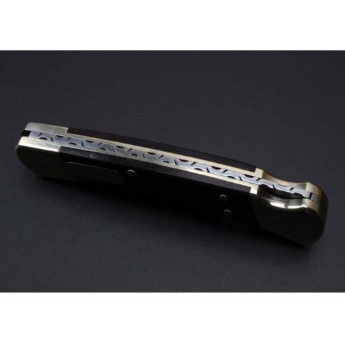 Buck 110 Folding Knife: Classic Damascus