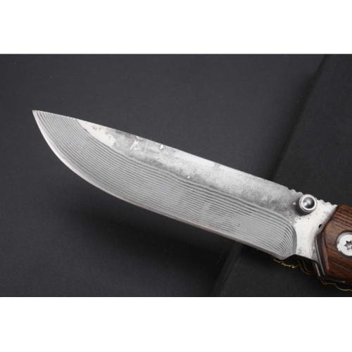 Damascus Boar\'s Tusk Folding Knife