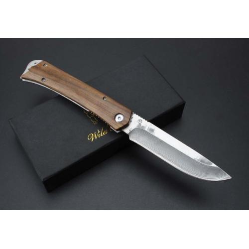 Damascus Boar\'s Tusk Folding Knife
