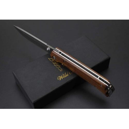 Damascus Boar\'s Tusk Folding Knife