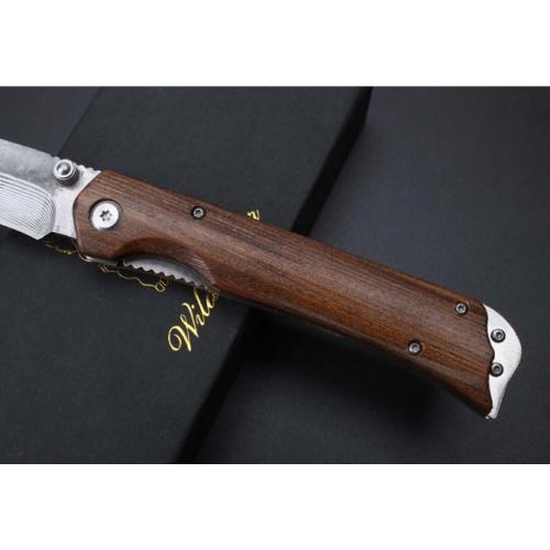 Damascus Boar\'s Tusk Folding Knife