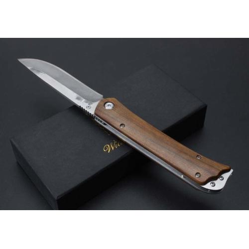 Damascus Boar\'s Tusk Folding Knife