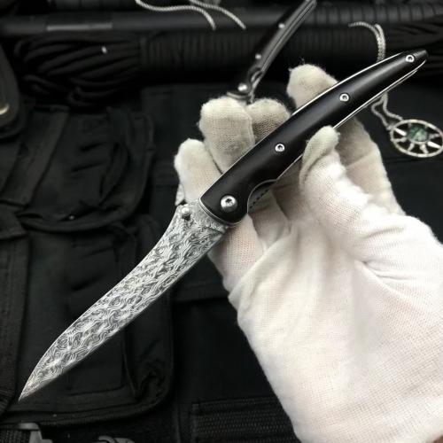 Classic Damascus Folding Knife with an Ebony Handle
