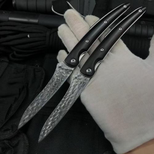 Classic Damascus Folding Knife with an Ebony Handle