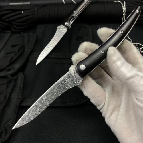 Classic Damascus Folding Knife with an Ebony Handle
