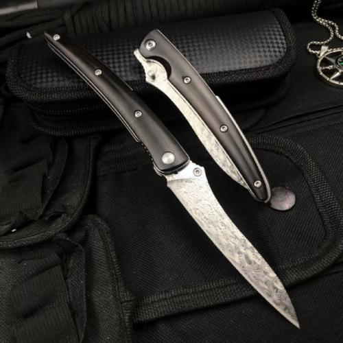 Classic Damascus Folding Knife with an Ebony Handle