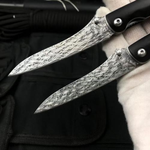 Classic Damascus Folding Knife with an Ebony Handle