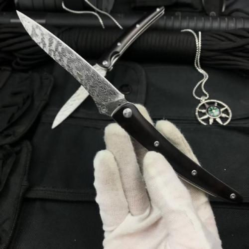 Classic Damascus Folding Knife with an Ebony Handle