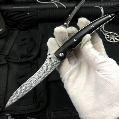 Classic Damascus Folding Knife with an Ebony Handle