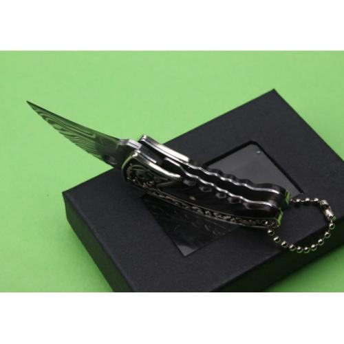 Swedish Powder Damascus Folding Knife with Engraved White Copper Claw