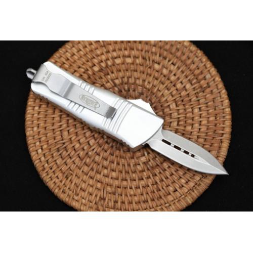 Introducing the Microtech Mini Dragon OTF in the sleek White Edition with a Spear Point blade.