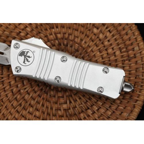 Introducing the Microtech Mini Dragon OTF in the sleek White Edition with a Spear Point blade.