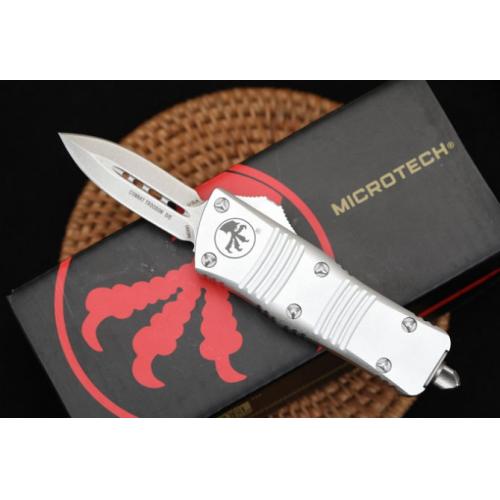 Introducing the Microtech Mini Dragon OTF in the sleek White Edition with a Spear Point blade.