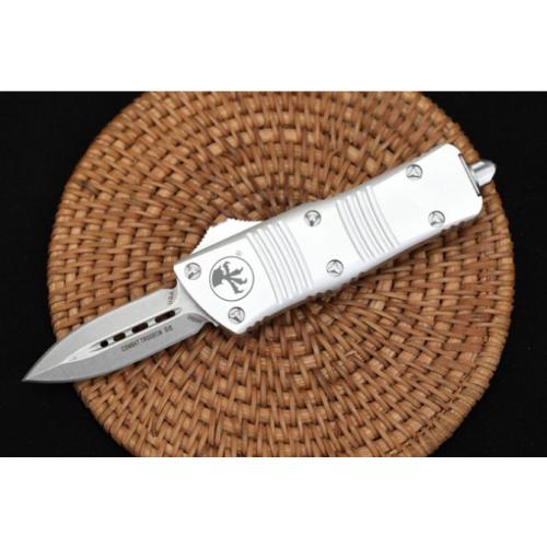Introducing the Microtech Mini Dragon OTF in the sleek White Edition with a Spear Point blade.