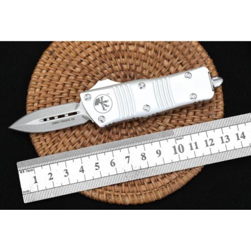 Introducing the Microtech Mini Dragon OTF in the sleek White Edition with a Spear Point blade.