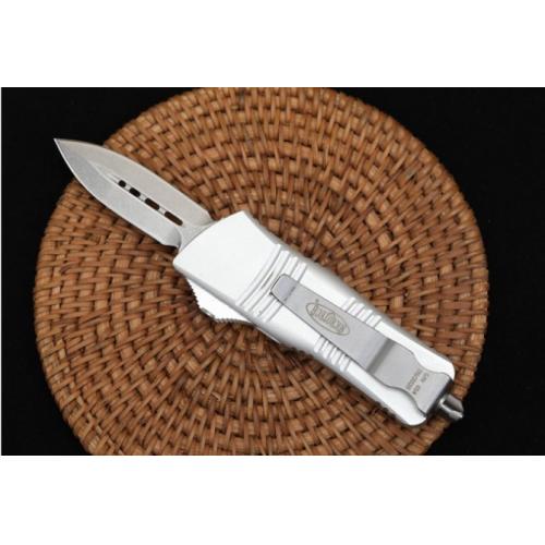 Introducing the Microtech Mini Dragon OTF in the sleek White Edition with a Spear Point blade.
