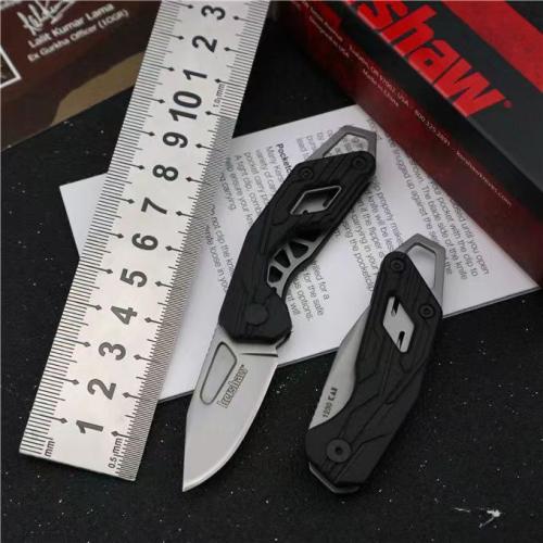 Introducing the Kershaw 1230 Keychain Folding Knife—a compact yet powerful tool designed for everyda...