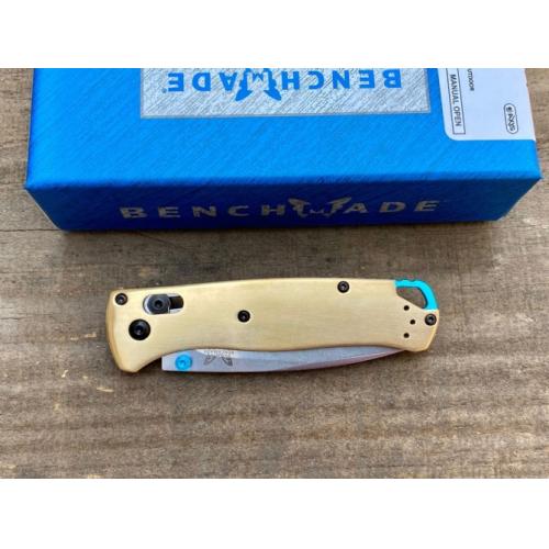 Butterfly 535 Brass Handle Folding Knife: A blend of elegance and precision, this knife features a durable brass handle 