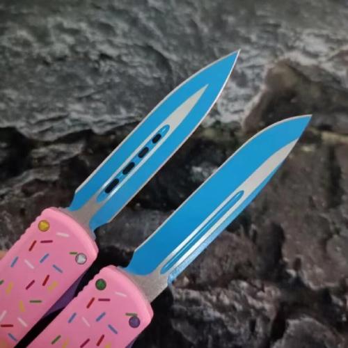 Introducing the Microtech TU85 Donut OTF Knife: a blend of precision engineering and playful design. This knife combines