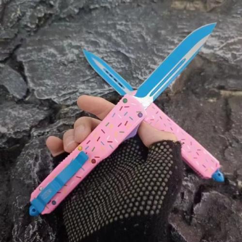 Introducing the Microtech TU85 Donut OTF Knife: a blend of precision engineering and playful design. This knife combines