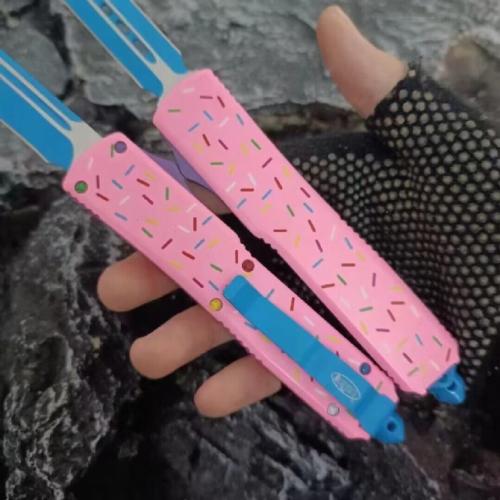 Introducing the Microtech TU85 Donut OTF Knife: a blend of precision engineering and playful design. This knife combines
