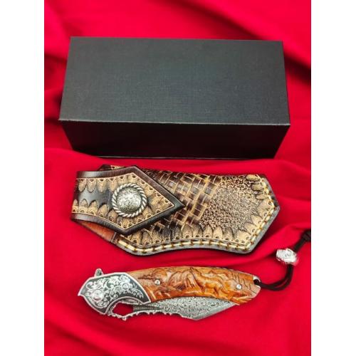 Wolf Howl Damascus Folding Knife