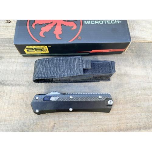 Introducing the New Microtech Troodon OTF Knife with a Damascus Carbon Fiber Handle.