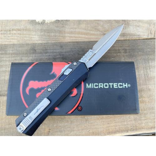 Introducing the New Microtech Troodon OTF Knife with a Damascus Carbon Fiber Handle.