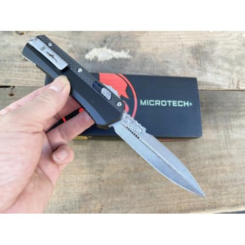 Introducing the New Microtech Troodon OTF Knife with a Damascus Carbon Fiber Handle.