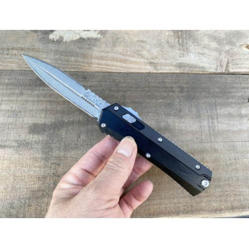 Introducing the New Microtech Troodon OTF Knife with a Damascus G10 Handle.