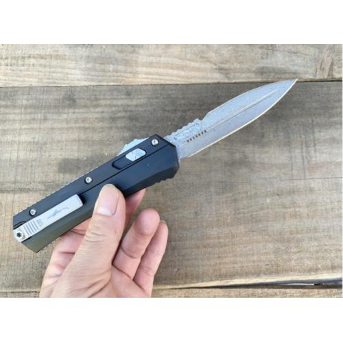 Introducing the New Microtech Troodon OTF Knife with a Damascus G10 Handle.