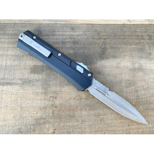 Introducing the New Microtech Troodon OTF Knife with a Damascus G10 Handle.