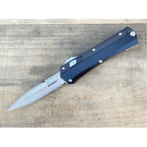 Introducing the New Microtech Troodon OTF Knife with a Damascus G10 Handle.