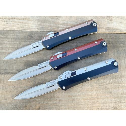 Introducing the New Microtech Troodon OTF Knife with a Damascus Aluminum Handle.