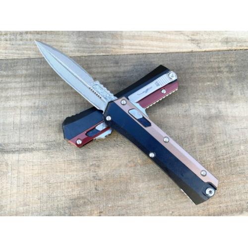 Introducing the New Microtech Troodon OTF Knife with a Damascus Aluminum Handle.