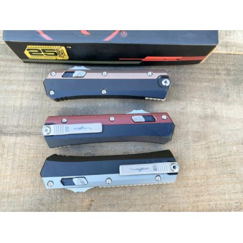 Introducing the New Microtech Troodon OTF Knife with a Damascus Aluminum Handle.