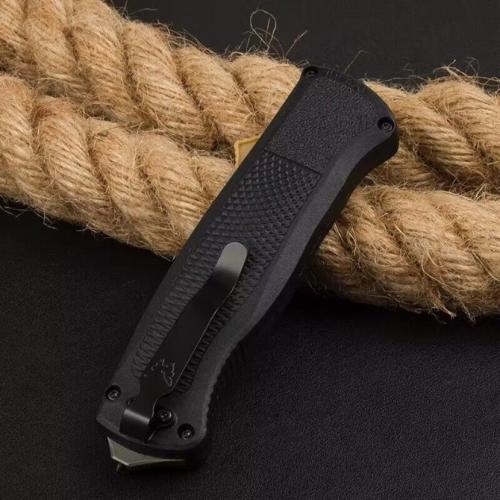 Introducing the new Benchmade 5370FE OTF Tactical Knife with a sleek black handle.