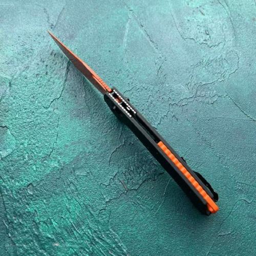 Butterfly 15535 with a Carbon Fiber Handle and Orange Blade