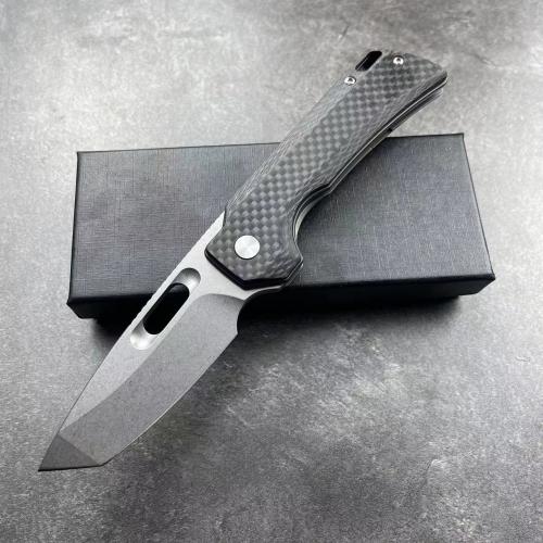 Introducing the JJ102-B Folding Knife, featuring a sleek carbon fiber handle.
