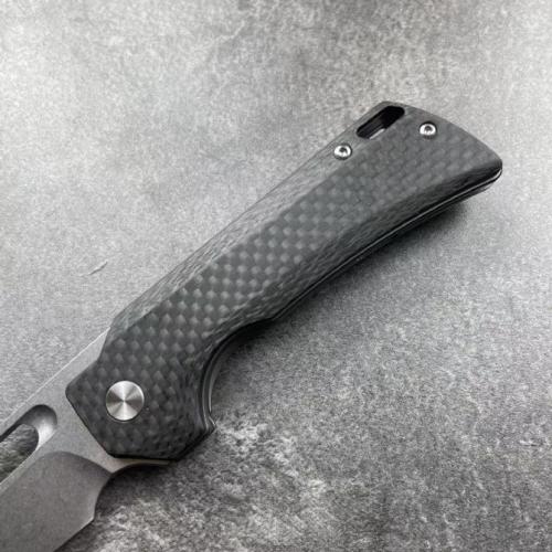 Introducing the JJ102-B Folding Knife, featuring a sleek carbon fiber handle.