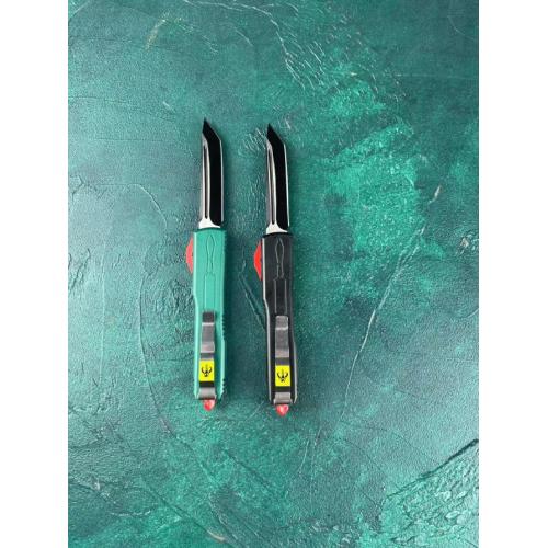 Microtech Bounty Hunter OTF Knife: Precision engineering meets bold design.