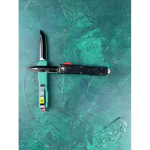 Microtech Bounty Hunter OTF Knife: Precision engineering meets bold design.