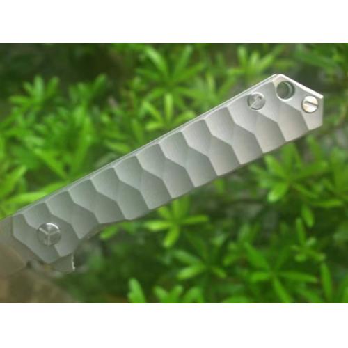 Introducing the Samurai Titanium Handle Quick-Open Folding Knife.