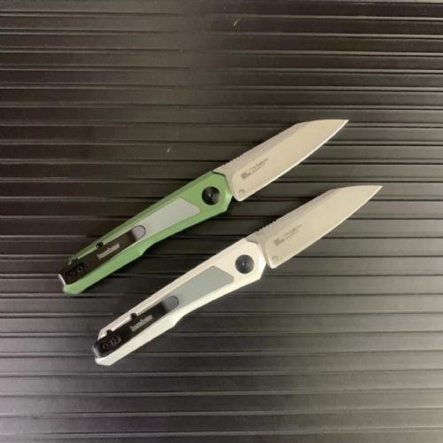Introducing the new Kaxiu 7050 Side-Opening Knife, featuring sleek G10 inlays.
