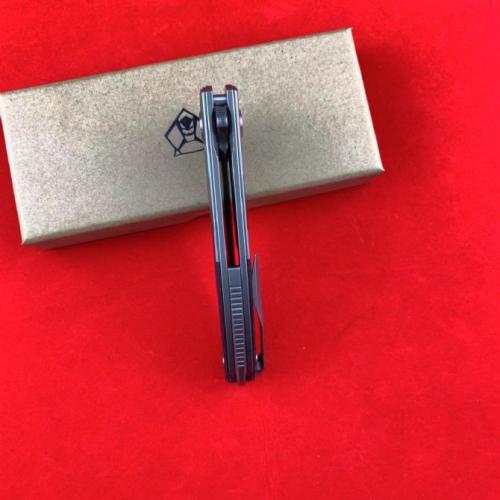 Bear Head F95-1 Folding Knife: Titanium & Carbon Fiber Damascus
