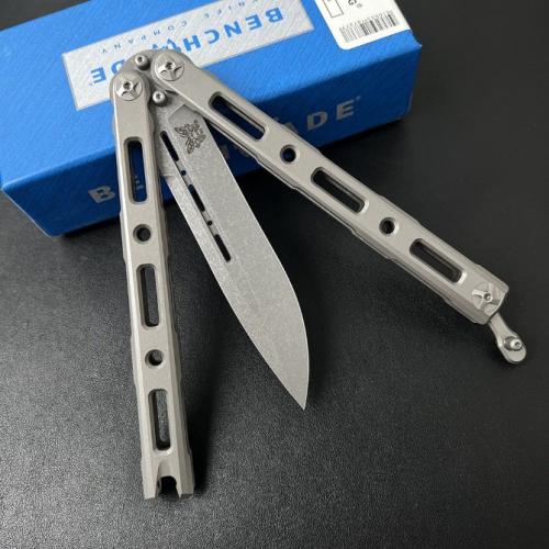 Introducing the Benchmade BM85 Titanium Butterfly Knife, featuring a sleek magnetic latch for seamless operation.