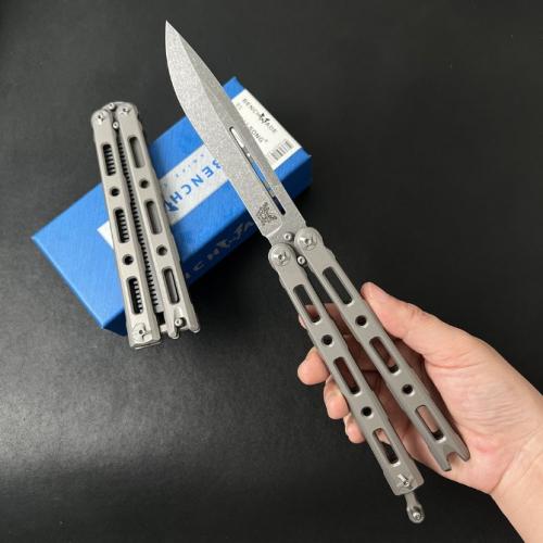 Introducing the Benchmade BM85 Titanium Butterfly Knife, featuring a sleek magnetic latch for seamless operation.