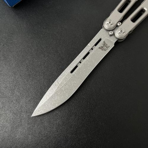 Introducing the Benchmade BM85 Titanium Butterfly Knife, featuring a sleek magnetic latch for seamless operation.