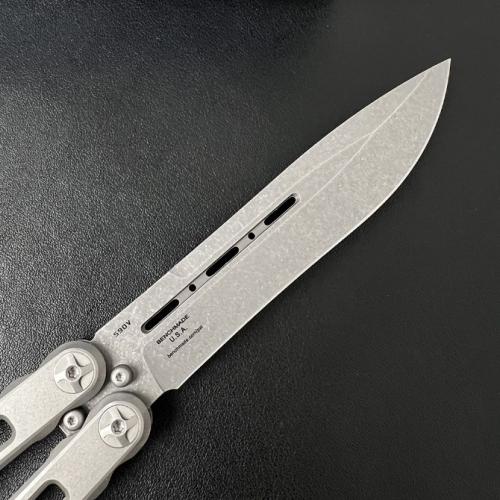 Introducing the Benchmade BM85 Titanium Butterfly Knife, featuring a sleek magnetic latch for seamless operation.