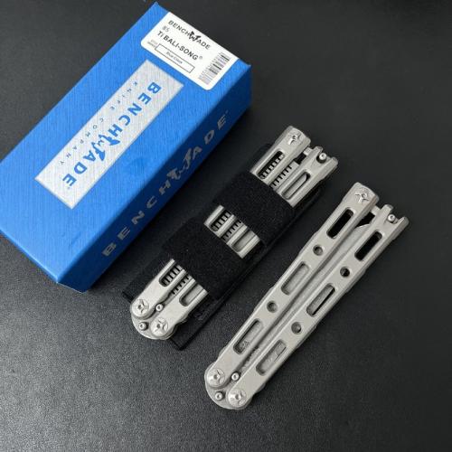 Introducing the Benchmade BM85 Titanium Butterfly Knife, featuring a sleek magnetic latch for seamless operation.